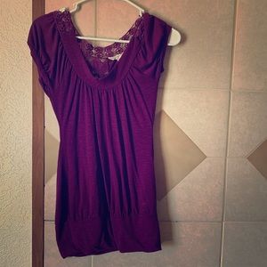 Woman’s purple blouse